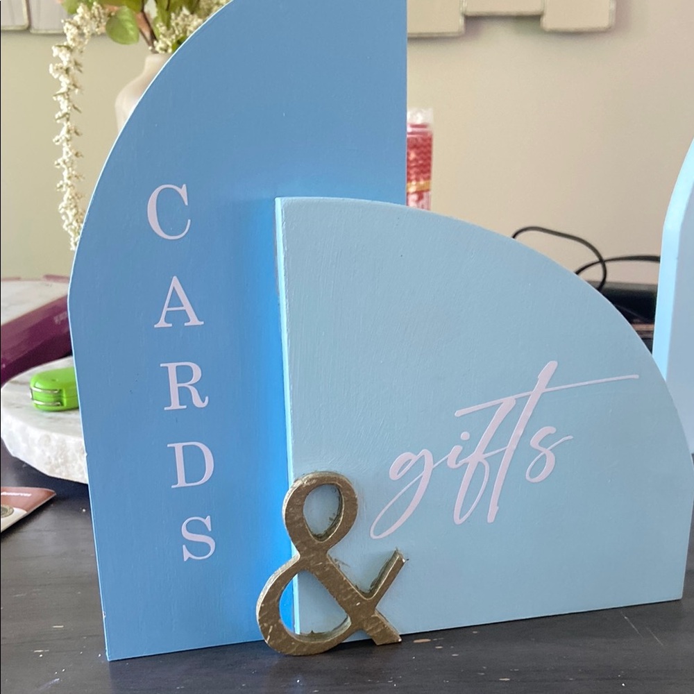 Blue 'Cards & Gifts' Sign with Gold Ampersand